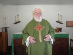 Father Bob Walden in Grace Episcopal church.  Photo Contributed: by Nita Bogart