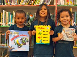 Keiki are excited to read their new books from the First Book program